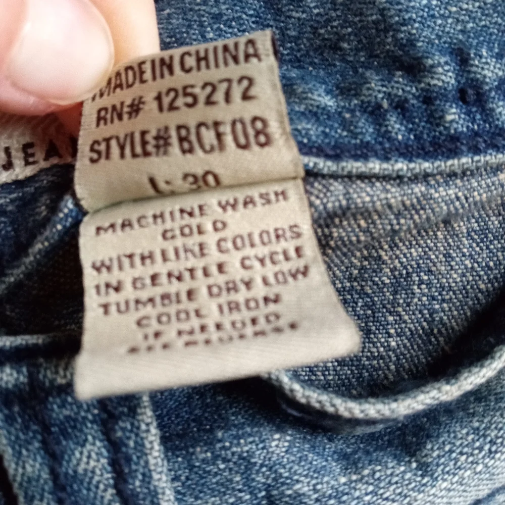 Oleg Cassini jeans with pocket embroidery